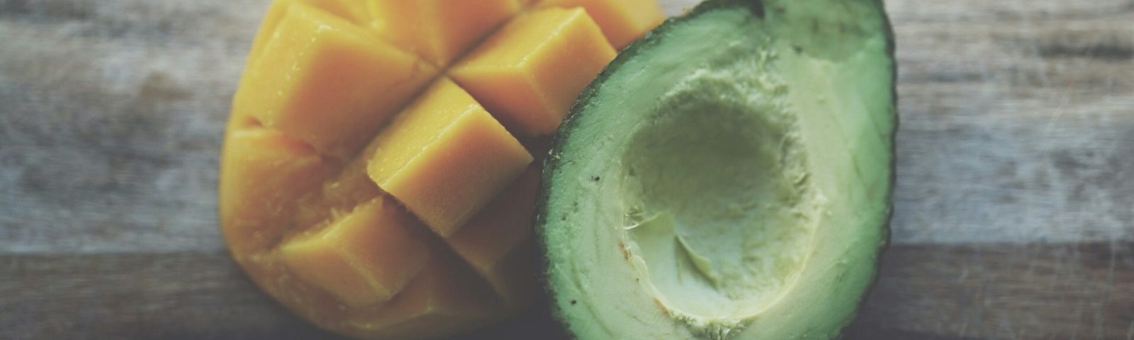 slice mango and avocado fruits in closeup photography