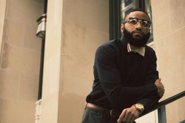 man wearing crew-neck sweater