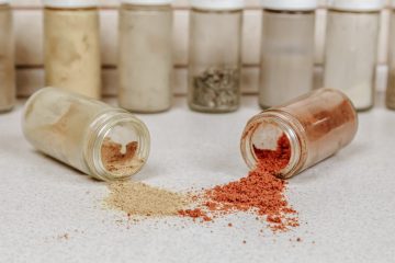 white powder in clear glass jars